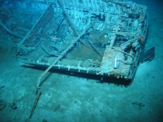 Remnants of motor and pipework in carvel built motor boat